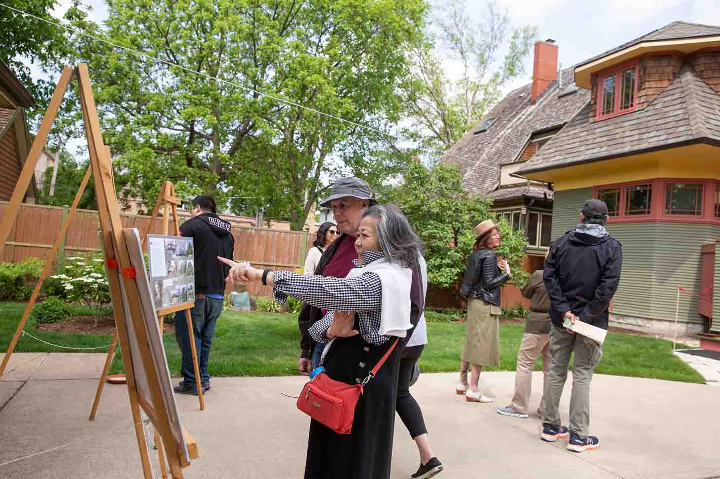 Guests check out house research boards