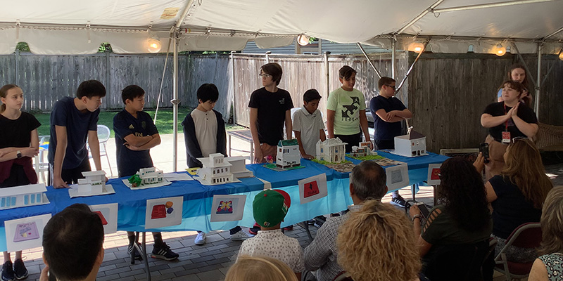 A Trust educator introduces the middle school campers at Friday’s Showcase