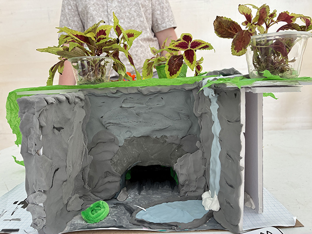 A close-up view of a camper’s finished model.
