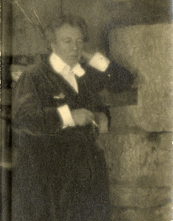 Frank Lloyd Wright Holding a Cigar