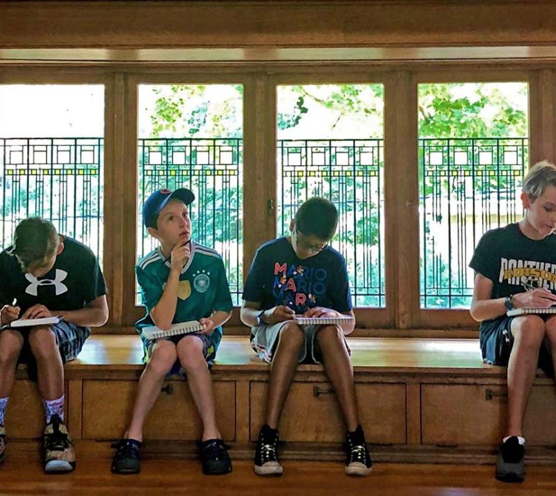 kids sketching in playroom
