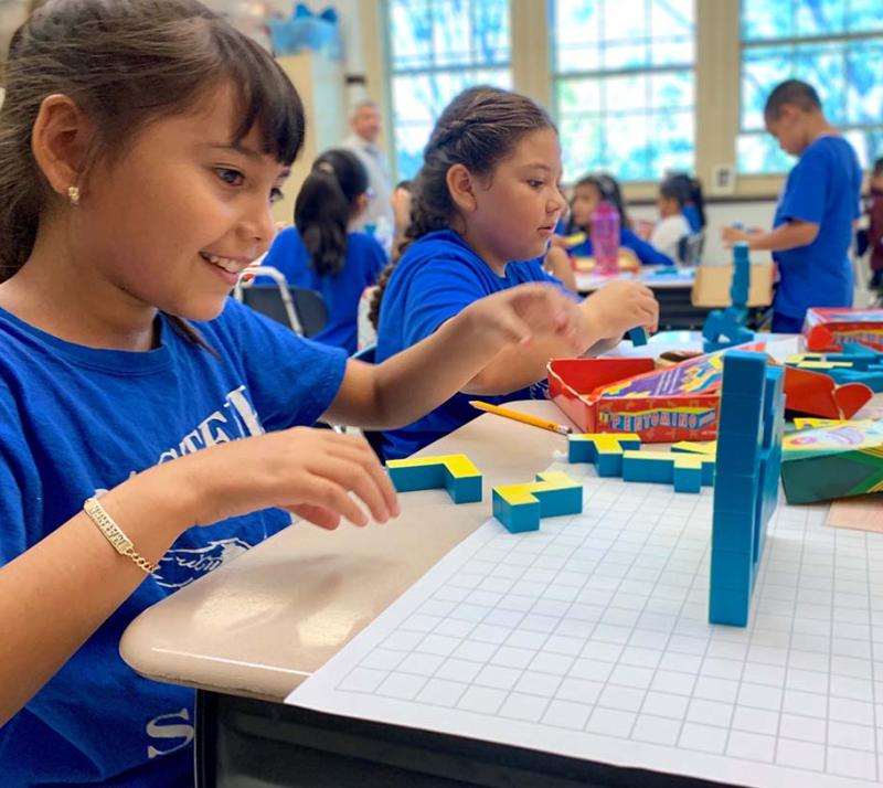 children learning in classroom