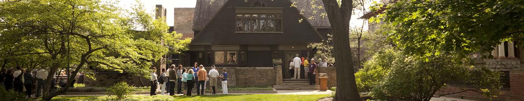 Wright Plus guests in front of the Home and Studio